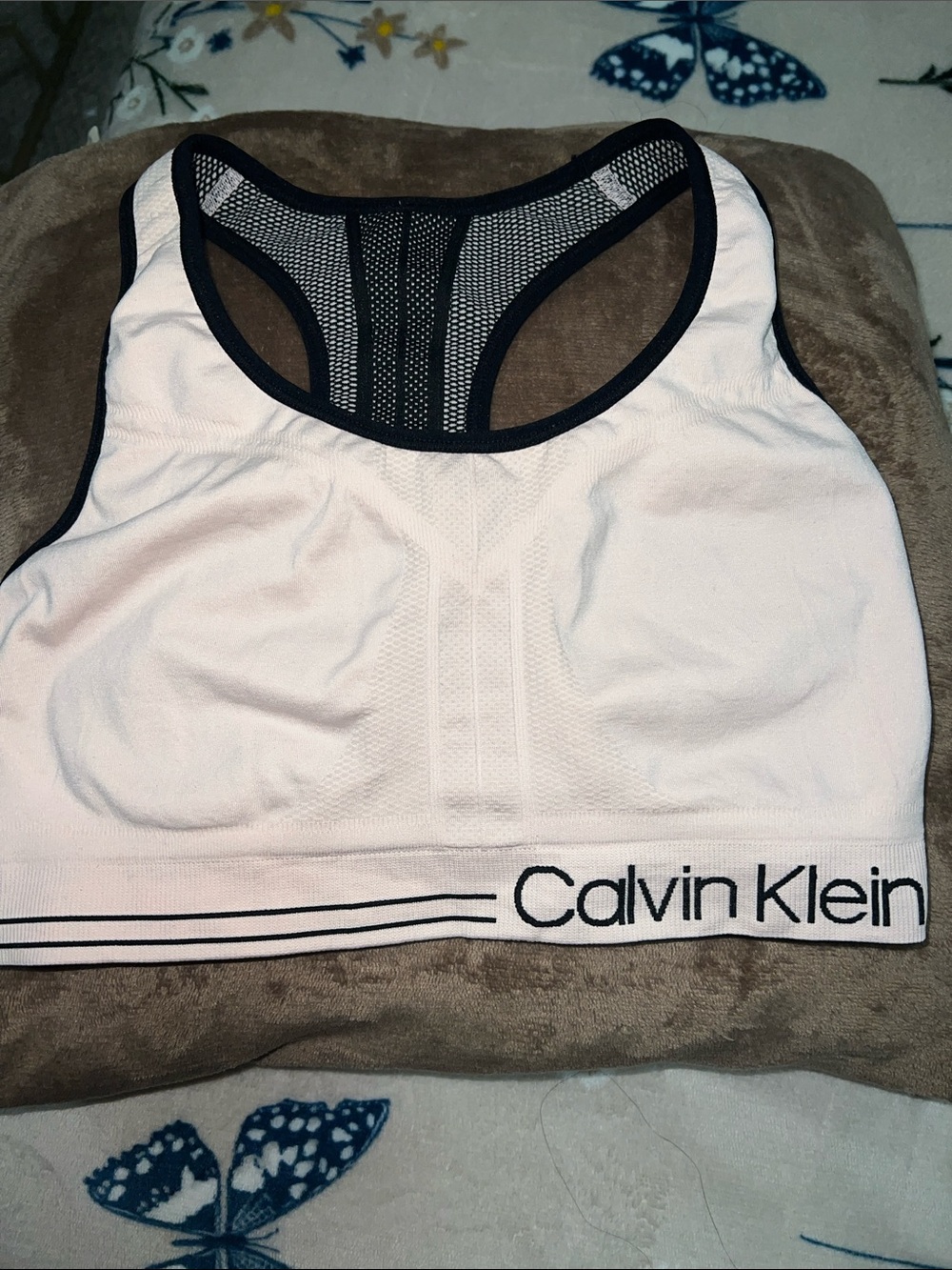 Calvin Klein Performance Reversible Racerback Medium Impact Sports Bra.